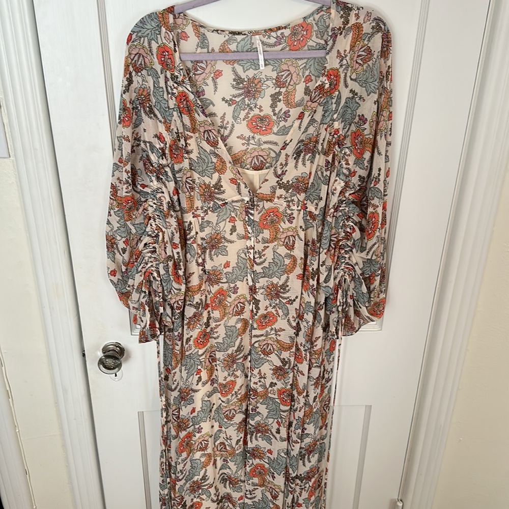gorgeous summer maxi dress from free people for a wedding guest or vacation